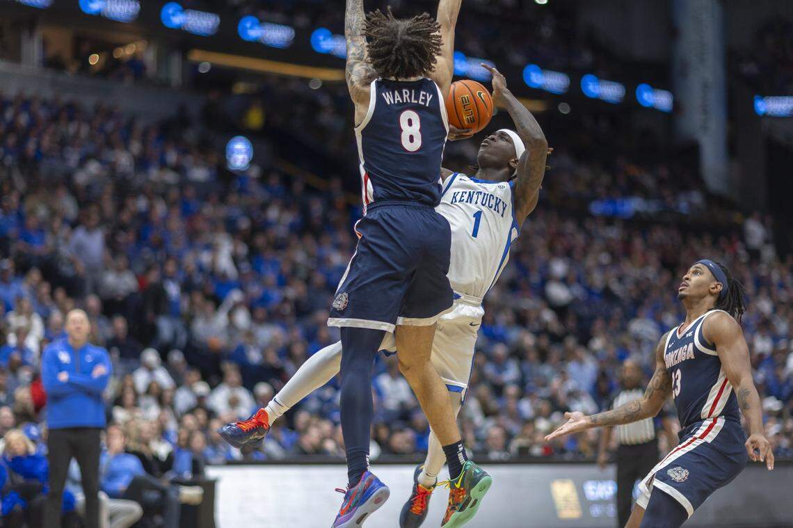 Kentucky guard Denzel Aberdeen attempts an off-balance shot as Gonzaga guard Jalen Warley defends during a game at Bridgestone Arena in Nashville, Tenn., on Friday.