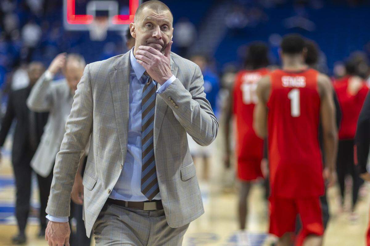Kentucky Wildcats head coach Mark Pope walks off the court following a loss to Georgia on Tuesday at Rupp Arena. 