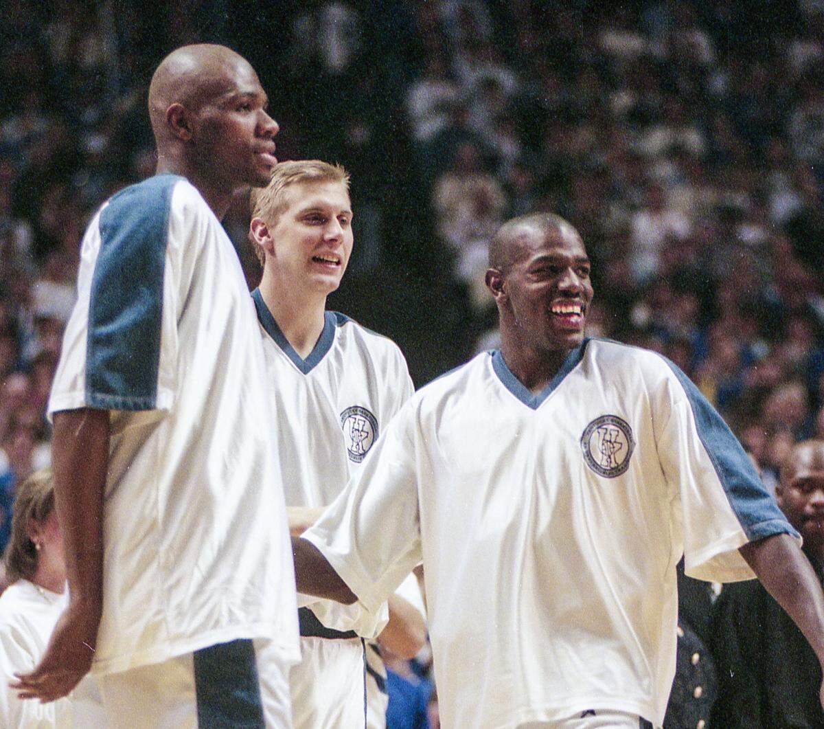 From left, Walter McCarty, Mark Pope and Tony Delk were co-captains of the 1996 national title team.
