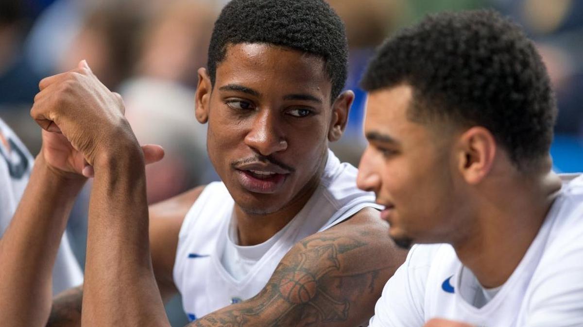 Kentucky guard Charles Matthews, left, talks with guard Jamal Murray during a break in the first half. The University of Kentucky hosted the University of Georgia, Tuesday, Feb. 09, 2016 at Rupp Arena in Lexington.