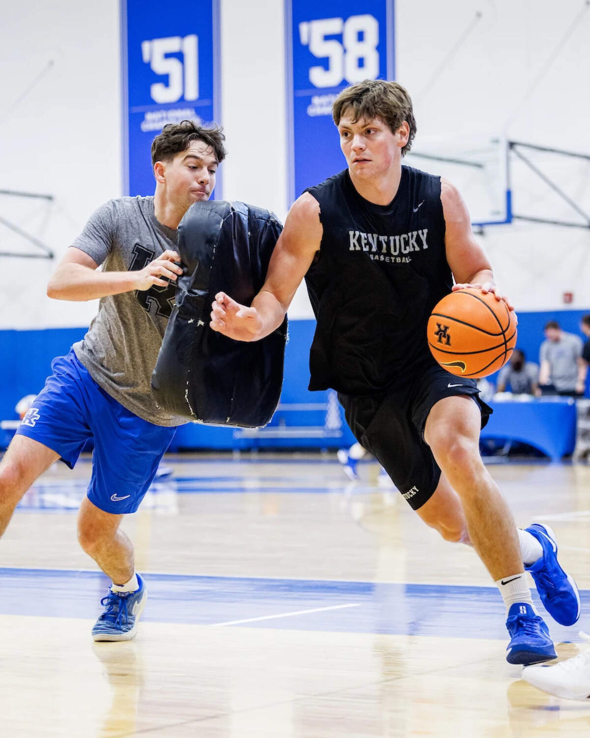 Trent Noah, right, during one of UK’s first practices of the summer session. Noah is entering his third season as a Kentucky Wildcat.