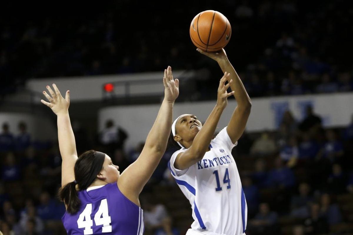 Kentucky forward Tatyana Wyatt (14) puts up a shot over Evansville Lady Aces center Kelsi Scott (44) during the second half at Memorial Coliseum in Lexington, KY., on Tuesday, December 5, 2017.