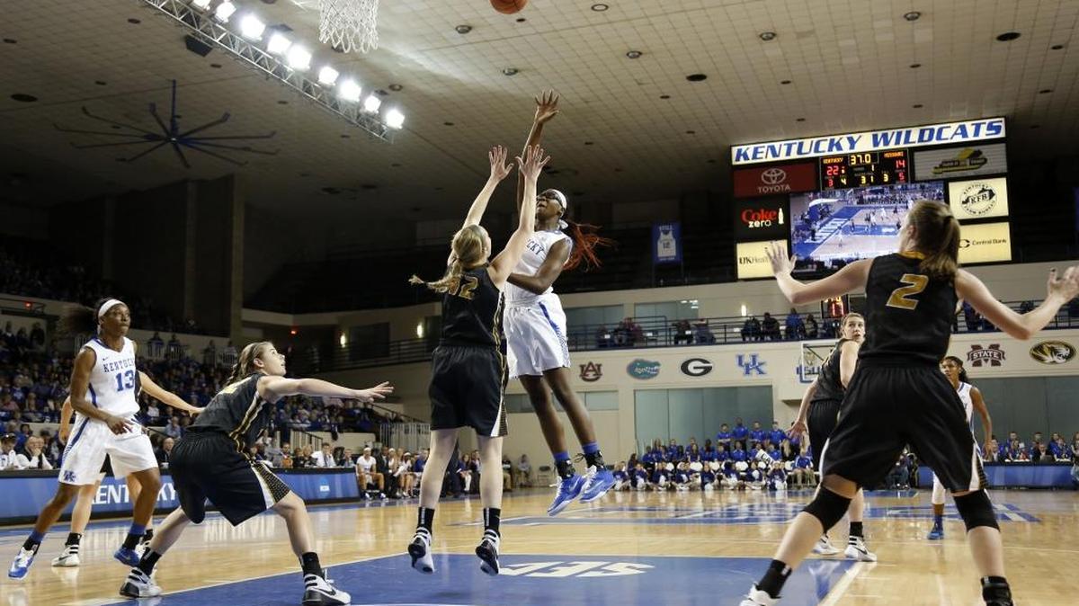 Kentucky forward Batouly Camara (1) shoots over Missouri forward Michelle Hudyn (12) during the first half at Memorial Coliseum Thursday, Feb. 25, 2016 in Lexington, Ky.