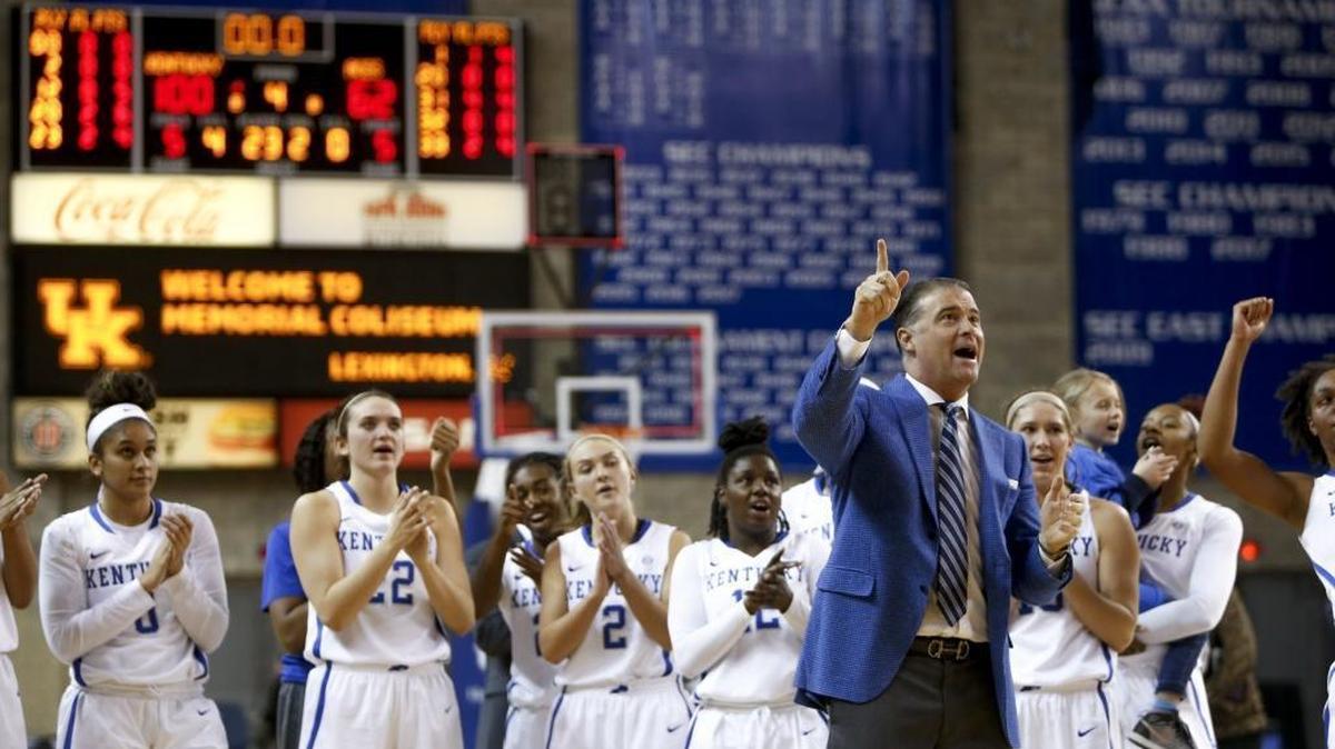Kentucky Wildcats head coach Matthew Mitchell and the team celebrate after defeating the Evansville Lady Aces 100-62 at Memorial Coliseum in Lexington, on Tuesday, December 5, 2017.