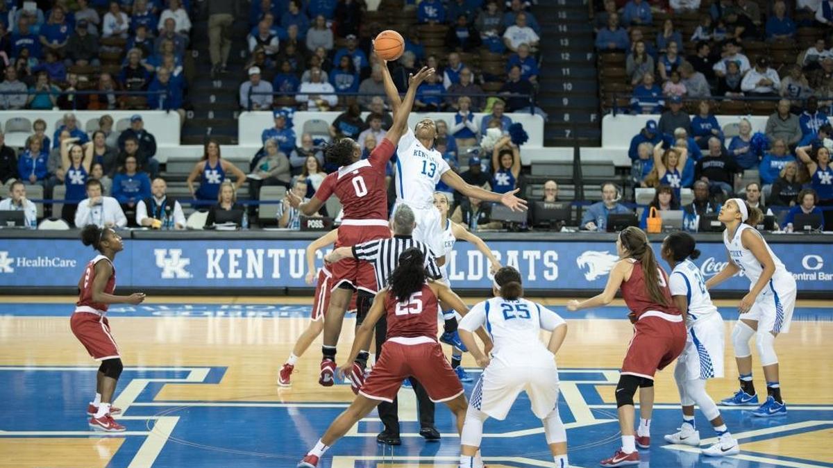 Wildcats forward Evelyn Akhator (13) outjumped Sooners center Vionise Pierre-Louis for the tip as No. 17 UK hosted No. 12 Oklahoma on Thursday in Memorial Coliseum.