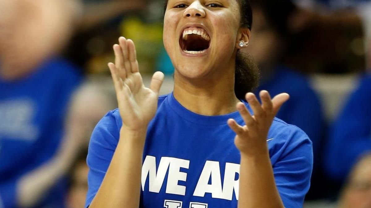 Kentucky guard Makayla Epps (25) celebrates a basket from the bench during the second half at Memorial Coliseum Friday, Nov. 13, 2015 in Lexington, Ky. Photo by Amy Wallot