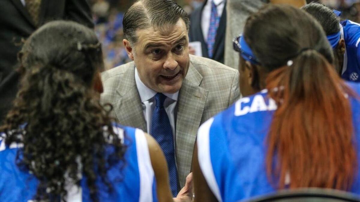 Kentucky head coach Matthew Mitchell speaks with his players during an NCAA college basketball game against Florida in the Southeastern Conference women's tournament in Jacksonville, Fla., Friday, March 4, 2016.