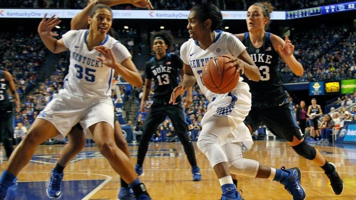 Kentucky guard Taylor Murray (24) drives to the basket during the second half Sunday, Dec. 20, 2015 in Lexington, Ky.