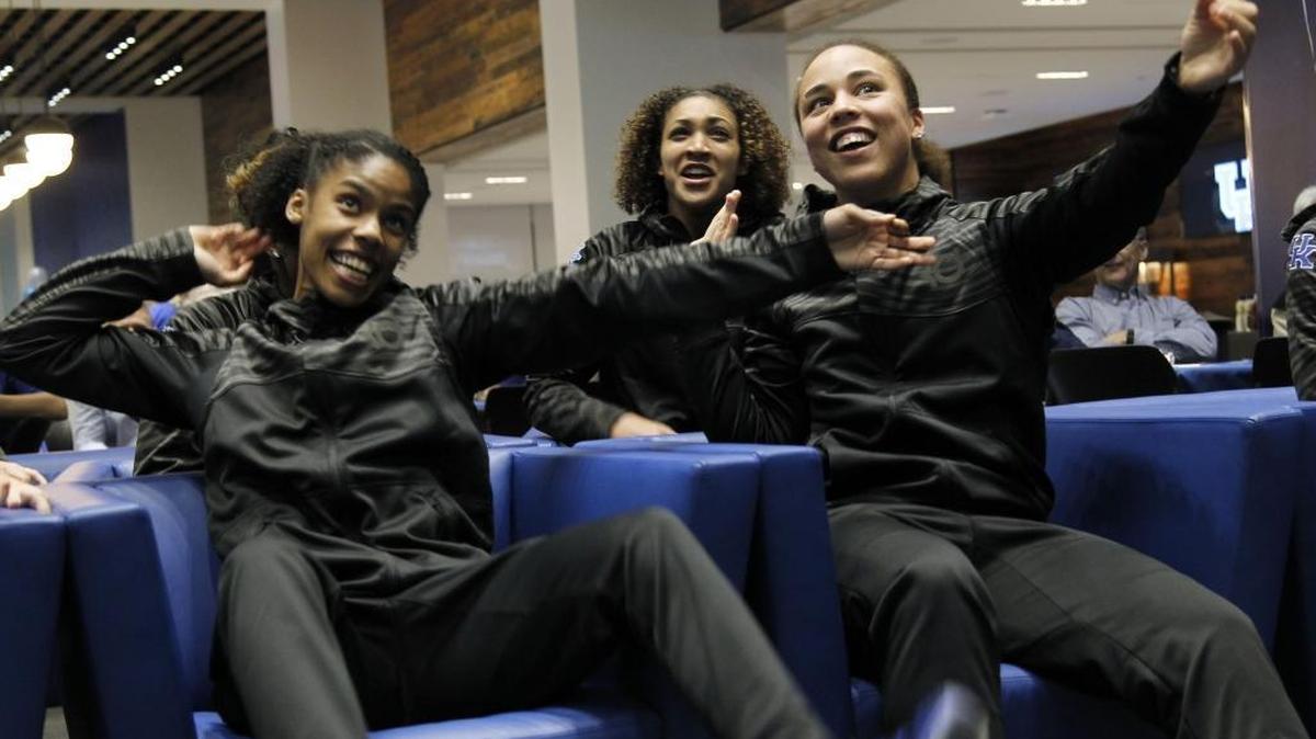 Kentucky's Janee Thompson and Makayla Epps shoot imaginary arrows after being named a No. 3 seed during the NCAA Women's Tournament Selection Show at Woodford Reserve Room at Commonwealth Statium Monday, March 14, 2016 in Lexington, Ky.