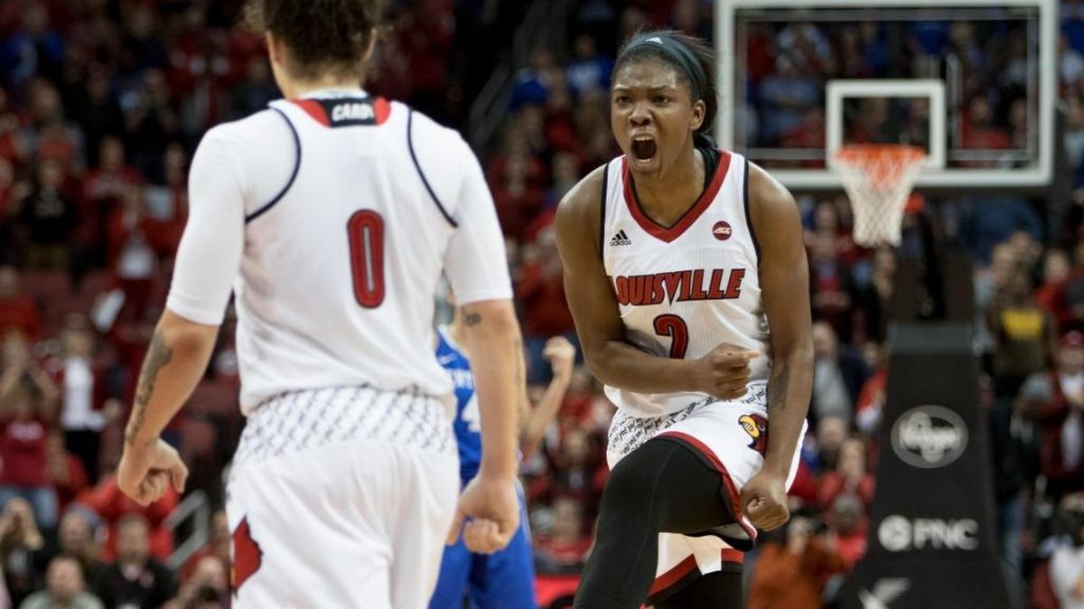 Louisville forward Myisha Hines-Allen, right, celebrates late in the second half against Kentucky.