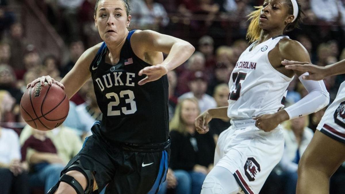 Duke guard Rebecca Greenwell (23), left, dribbled by South Carolina guard Tiffany Mitchell during the second half on Sunday, Dec. 6, 2015, in Columbia, S.C. South Carolina defeated Duke 66-55.