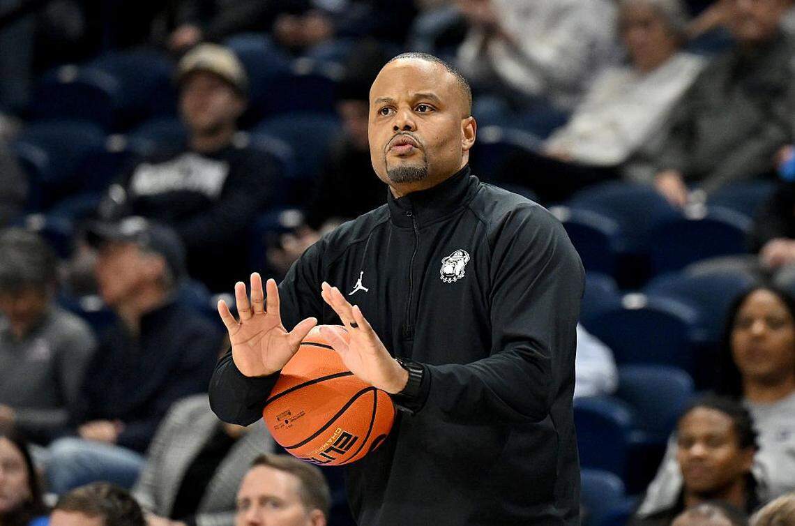 Head coach Darnell Haney of the Georgetown Hoyas motions to his team during the first quarter against the Connecticut Huskies at Entertainment & Sports Arena on January 22 in Washington, D.C. 