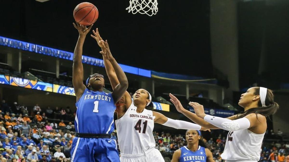 Kentucky forward Batouly Camara (1) shoots the ball defended by South Carolina center Alaina Coates (41), right, during an NCAA college basketball game in the Southeastern Conference women's tournament semifinal in Jacksonville, Fla., Saturday, March 5, 2016.