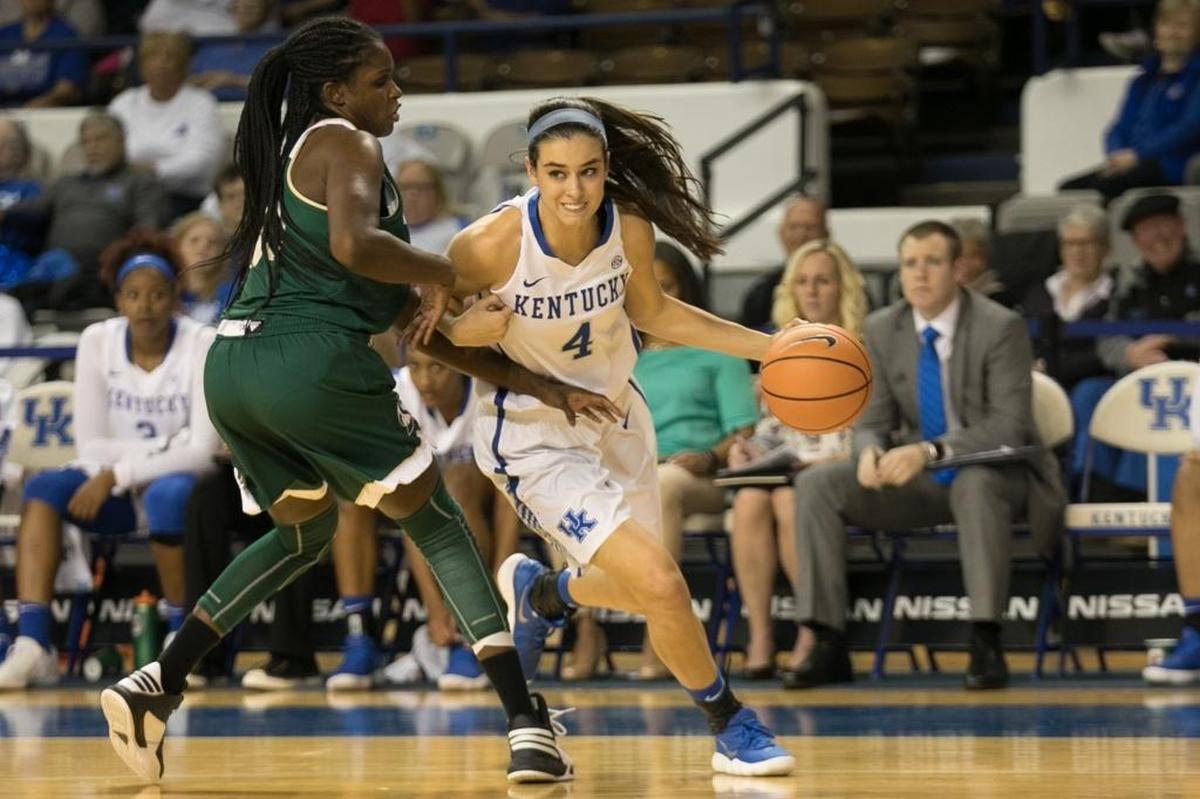 Kentucky guard Maci Morris (4) drove past Sacramento State Hornets forward Kyhonta Doughty (30) as UK women's basketball team defeated Sacramento State 101-70 at Memorial Coliseum on Friday Nov. 10, 2017 in Lexington, Ky.