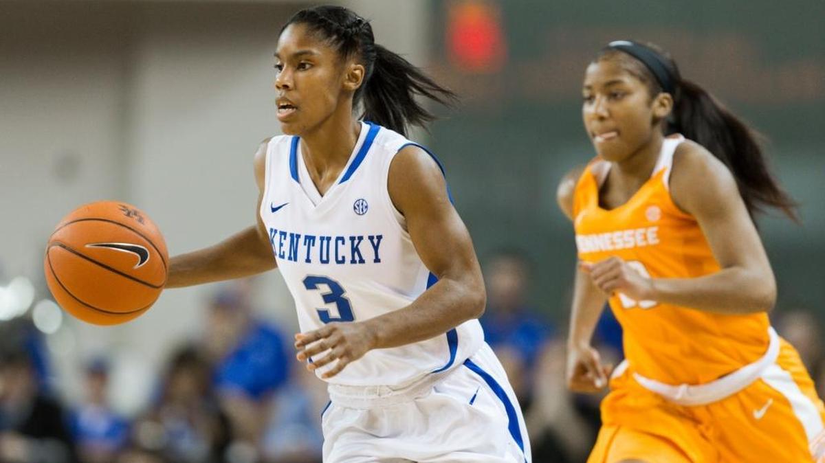 Kentucky guard Janee Thompson, left, looks for an open teammate in the first half. The University of Kentucky hosted the University of Tennessee, Monday, Jan. 25, 2016 at Memorial Coliseum in Lexington.