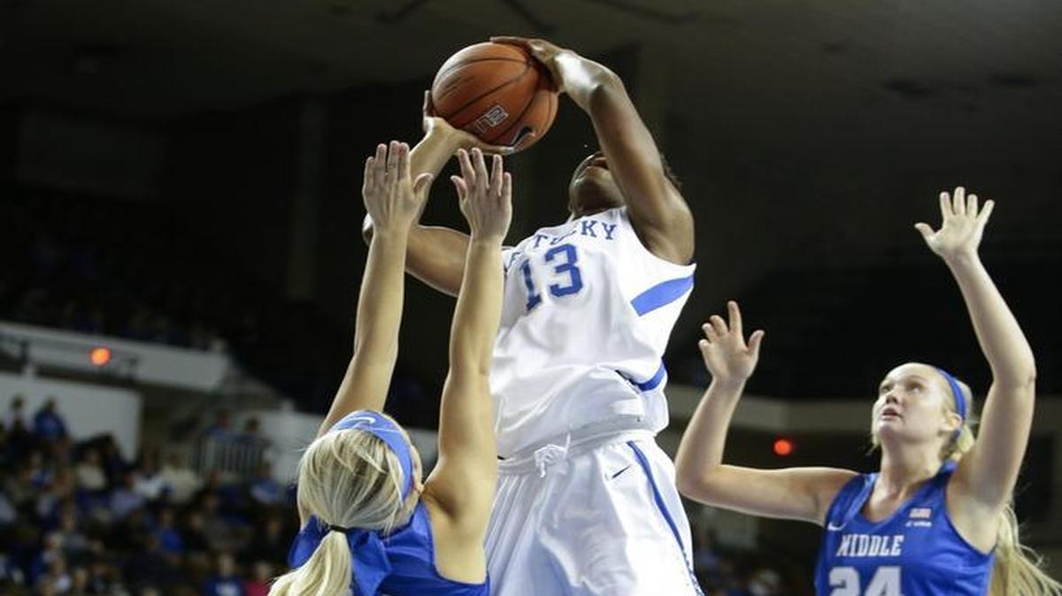 Kentucky forward Evelyn Akhator (13) scored over Middle Tennessee guard Katie Collier (14) on Friday in Lexington.