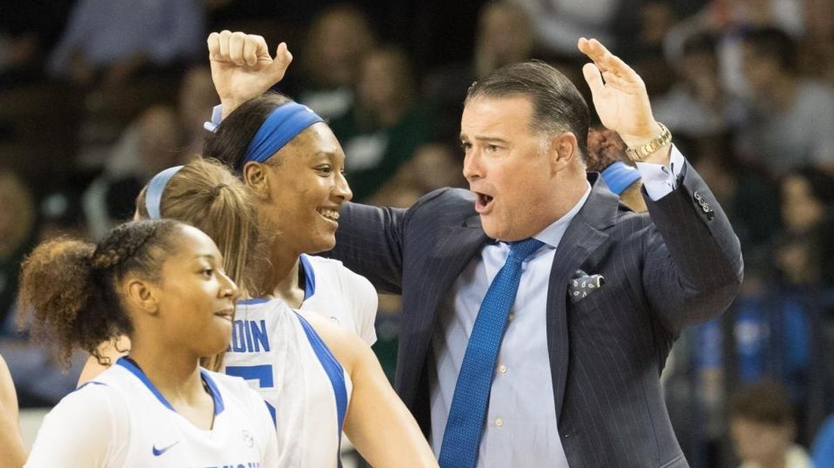 Kentucky Coach Matthew Mitchell celebrated with Tatyana Wyatt as the Cats defeated Sacramento State 101-70 in Memorial Coliseum on Friday.