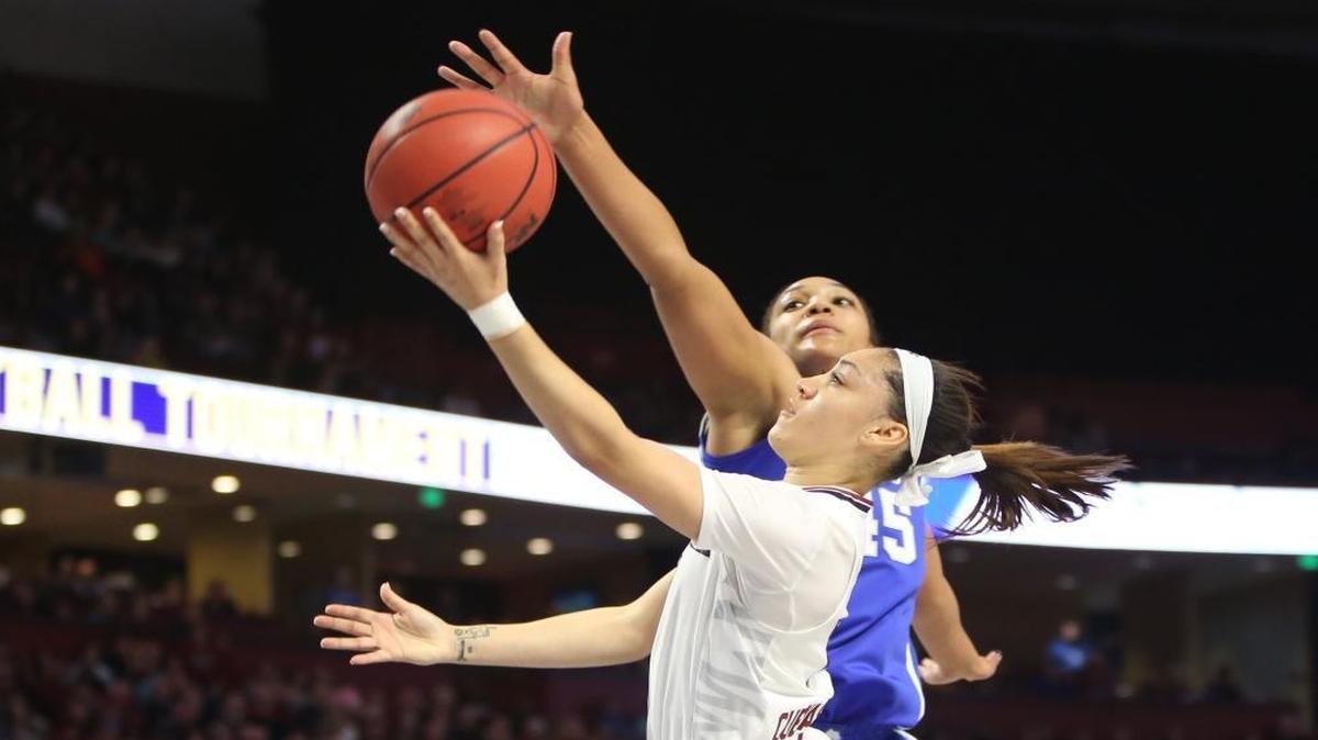 South Carolina's Bianca Cuevas-Moore (1) shoots as Kentucky's Alyssa Rice (45) defends during the first half of action in the SEC Tournament at Bon Secours Wellness Arena in Greenville.