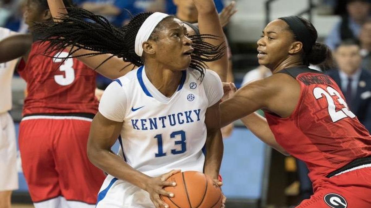 Wildcat Evelyn Akhator (13) looked to score against Georgia’s Halle Washington (23) on Jan. 15 in Lexington. Akhator is averaging 19.7 points and 10.7 rebounds in SEC games this season.