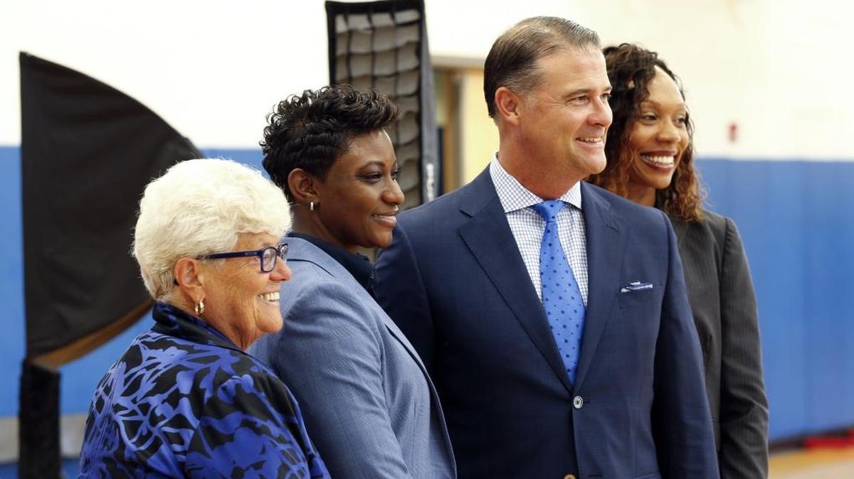 Coaches L-R: Lin Dunn, Niya Butts, head coach Matthew Mitchell, Kyra Elzy, during the University of Kentucky women's annual basketball Photo Day held in the Joe Craft Center in Lexington, Ky., Monday, August 21, 2017.