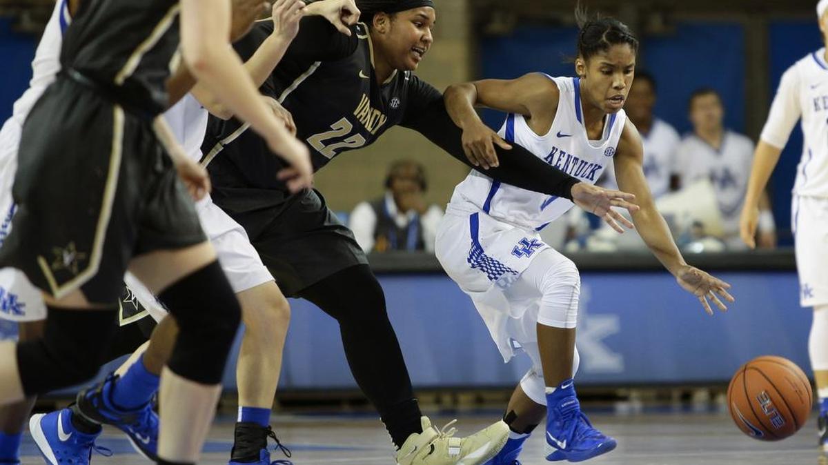 Kentucky guard Janee Thompson (3) steals the ball from Vanderbilt forward Marqu'es Webb (22) during the second half Thursday, Jan. 28, 2016 in Lexington, Ky.