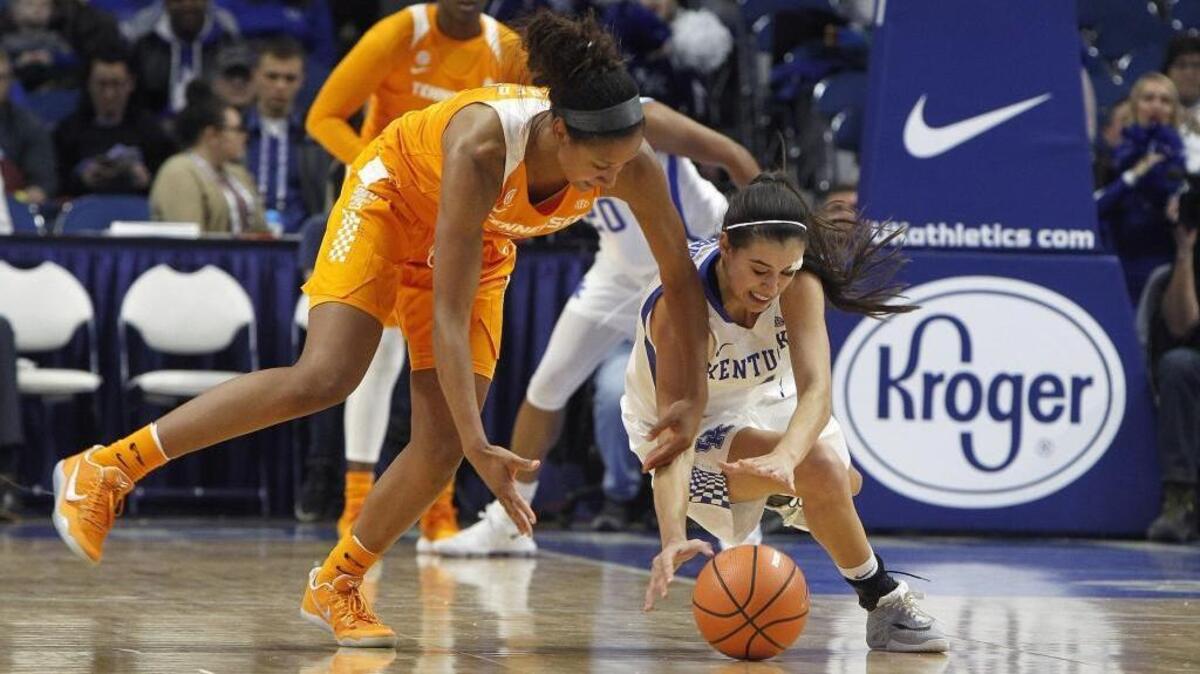 Tennessee's Jaime Nared, left, battles for the ball with Kentucky's Maci Morris during an NCAA college basketball game in Lexington, Ky., Sunday, Dec. 31, 2017.