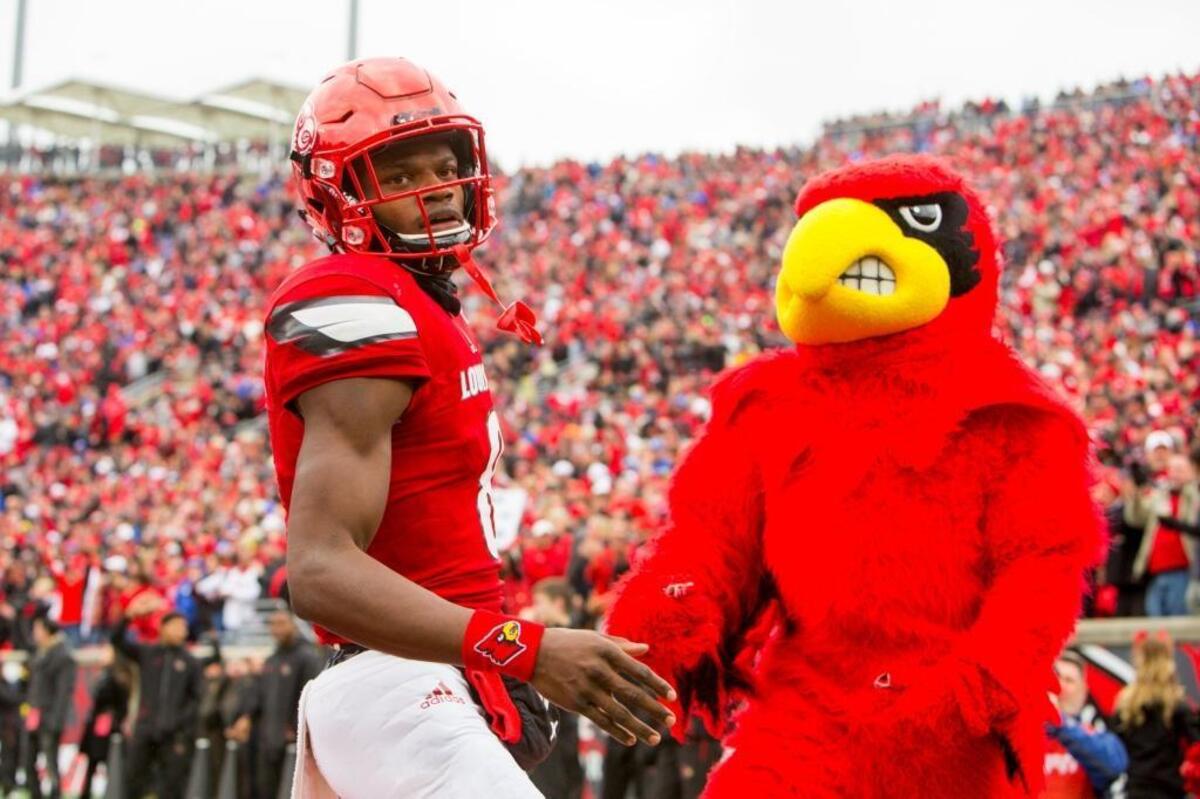 Louisville quarterback Lamar Jackson accepted congratulations from The Cardinal mascot after scoring a touchdown versus Kentucky last season. In two career games against UK, Jackson has run for 358 yards and four touchdowns and passed for 441 yards and three TDs.
