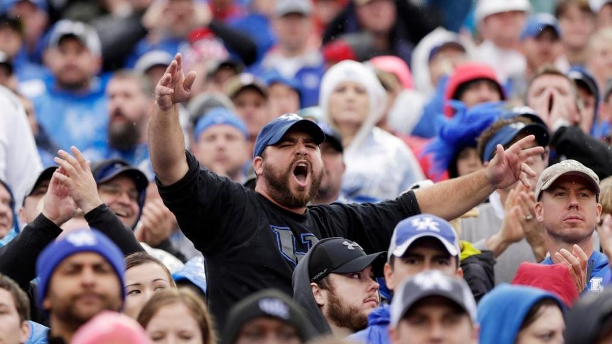 A Kentucky fan was pumped up in the third quarter of the Louisville at Kentucky football game at Commonwealth Stadium in Lexington, Ky, on Nov. 28, 2015. Louisville came back in the second half to beat the Wildcats 38-24.