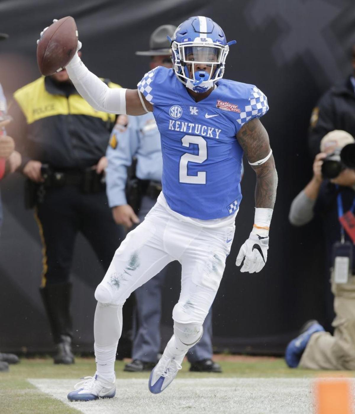 Dorian Baker celebrated a touchdown during Kentucky’s game against Georgia Tech in the TaxSlayer Bowl at Jacksonville, Fla., on Dec. 31, 2016. Baker has not played in a game since then after breaking his ankle in the preseason last fall.