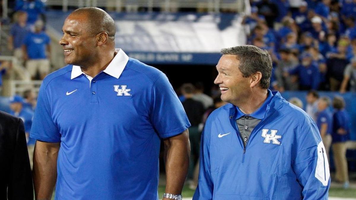 Art Still, with Mitch Barnhart on the right, was honored for his upcoming induction into the College Football Hall of Fame during Kentucky’s game against Florida on Saturday, Sept. 19, 2015.