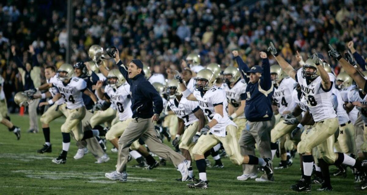 The longest streak. The Navy bench stormed the field after defeating Notre Dame 46-44 in triple overtime in college football action in South Bend, Ind., Saturday, Nov. 3, 2007.