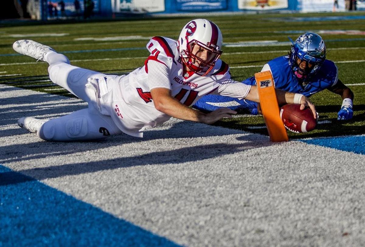 Mike White led Western Kentucky to a victory over Memphis in the Boca Raton Bowl last season.
