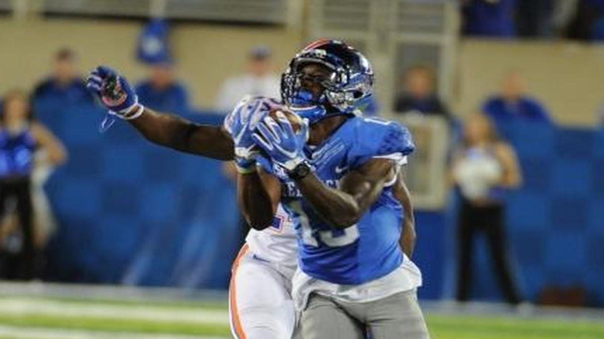 Kentucky WR Jeff Badet hauls in a 45-yard pass during the fourth quarter against Florida at Commonwealth Stadium in Lexington on Sept. 19, 2015.