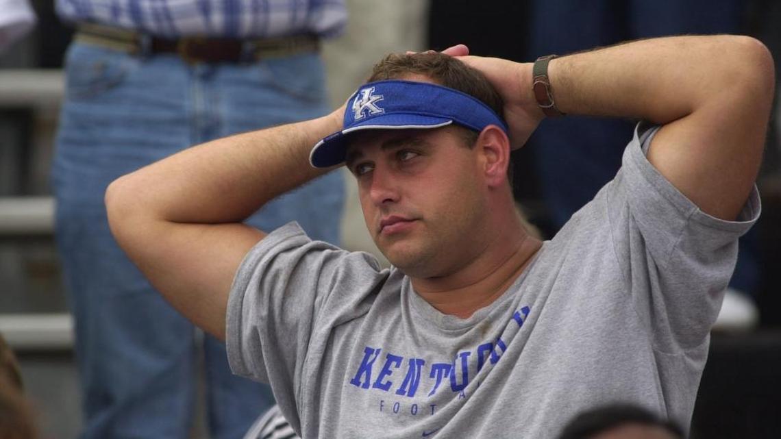 Joey Couch, who played football for UK from 1988-1991, remained a loyal fan of the Cats. Here, he watched with disappointment from the stands after South Carolina beat Kentucky in Commonwealth Stadium in 2001.