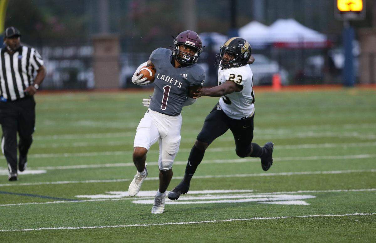 Wayne County (Georgia) linebacker Tavion Wallace (23) is rated as a four-star prospect by the 247Sports Composite.
