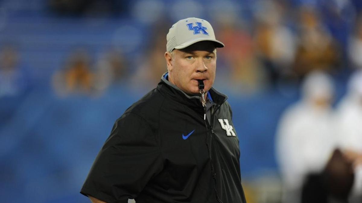 UK head coach Mark Stoops watches pregame warm-ups prior to the University of Kentucky-Missouri football game at Commonwealth Stadium in Lexington, Ky., on Saturday, September 26, 2015.