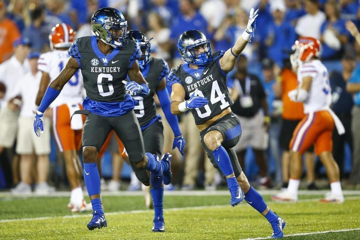 Kentucky Wildcats wide receiver Charles Moushey (84) celebrated after a big tackle on special teams versus Florida last season. The walk-on has graduated but his efforts still motivate teammates this season.