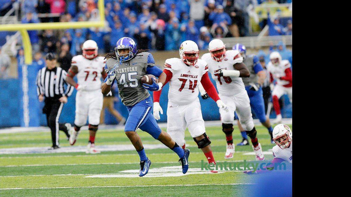Kentucky's Josh Forrest intercepted a pass by Louisville's Kyle Bolin and returned it 81 yards for a touchdown.