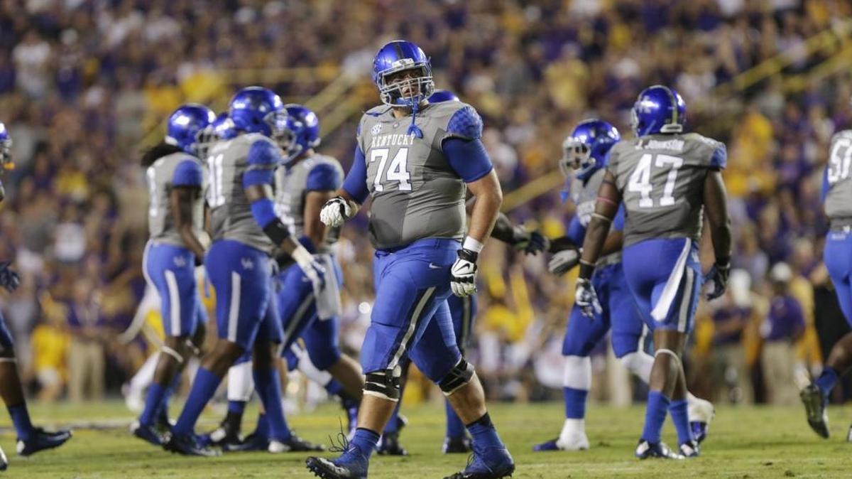 Offensive lineman Cole Mosier (74) walked to the sideline during Kentucky’s game against LSU on Oct. 18, 2014, in Baton Rogue, La.