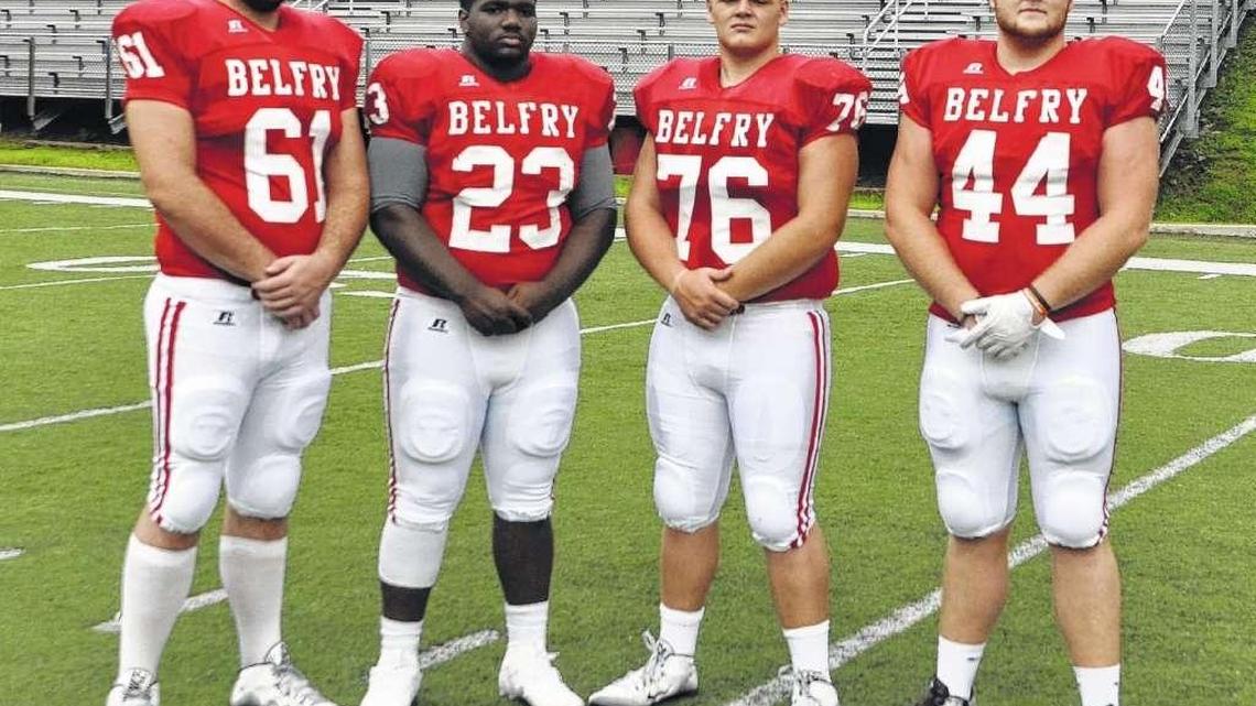 Belfry offensive tackle and Kentucky Wildcats football commit Austin Dotson, far left, credits former University of Kentucky and Belfry player David Jones with inspiring the dream of earning a scholarship to play at UK.