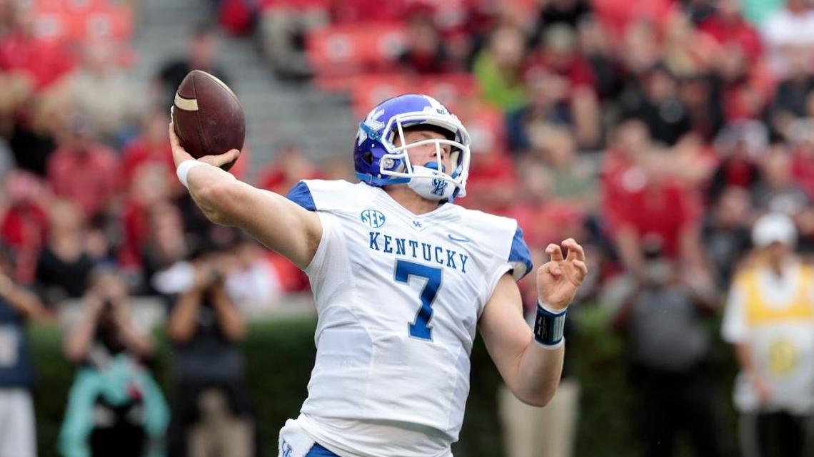 Kentucky quarterback Drew Barker released a pass as the University of Kentucky played the University of Georgia in Sanford Stadium in Athens, GA., Saturday, November 7, 2015. This is fourth quarter college football action. Georgia won 27-3. Photo by Charles Bertram | Staff