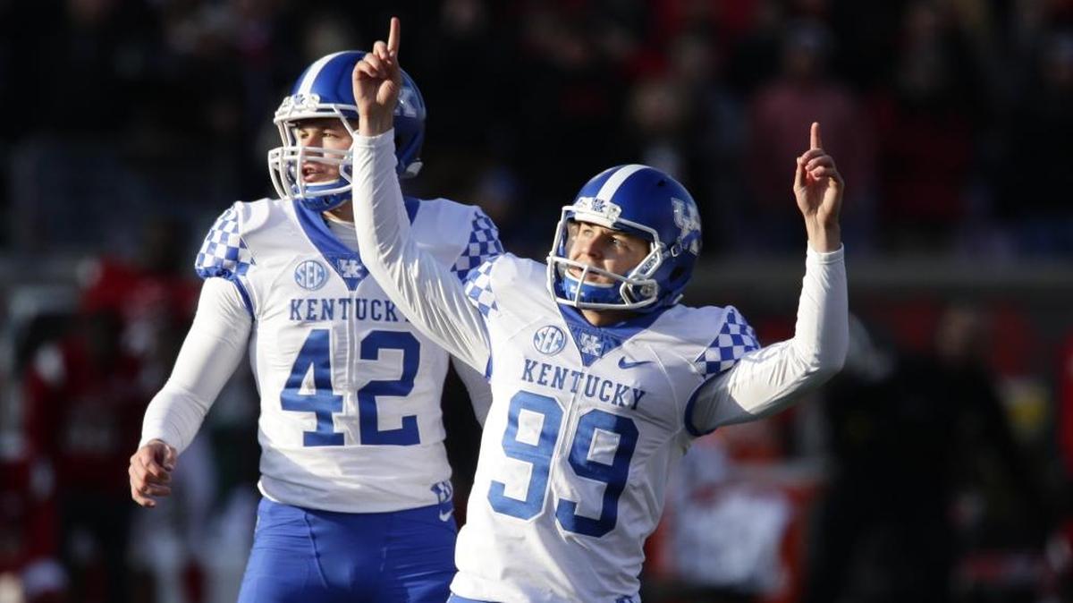 Kentucky place-kicker Austin MacGinnis (99) celebrated his game-winning 47-yard field goal that beat Louisville last season.