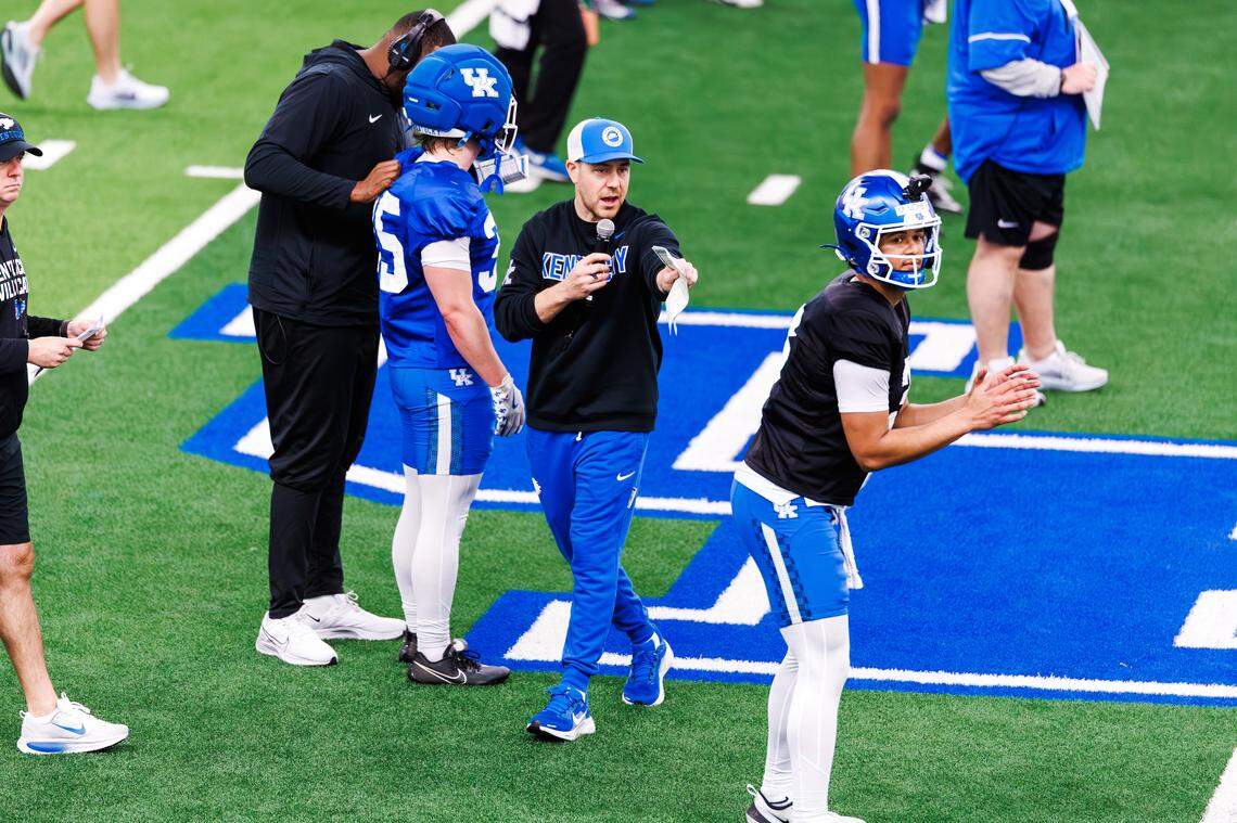 Kentucky football coach Will Stein relays instructions during spring practice.