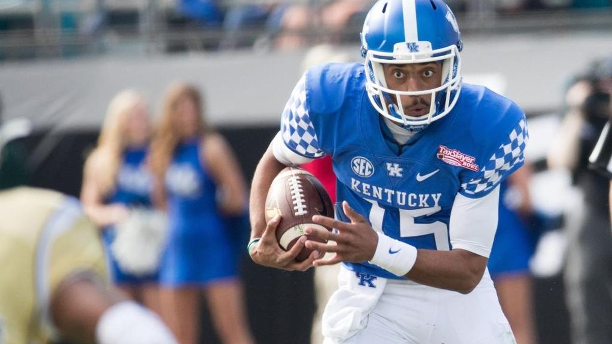 Kentucky quarterback Stephen Johnson ran the ball during the TaxSlayer Bowl last December.