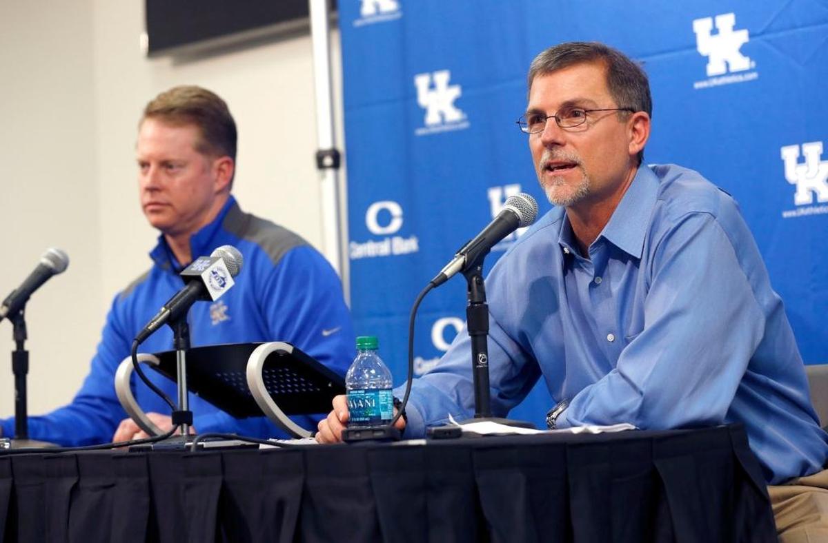 The Kentucky offensive brain trust of Eddie Gran, right, and Darin Hinshaw came up with a game plan that allowed wide receiver Lynn Bowden to thrive at quarterback in UK’s 24-20 win over Arkansas last week.