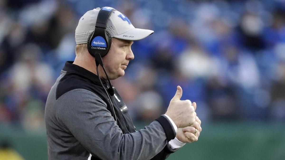 Kentucky Coach Mark Stoops watches from the sideline in the first half of the Music City Bowl NCAA college football game against Northwestern, Friday, Dec. 29, 2017, in Nashville, Tenn. (AP Photo/Mark Humphrey)