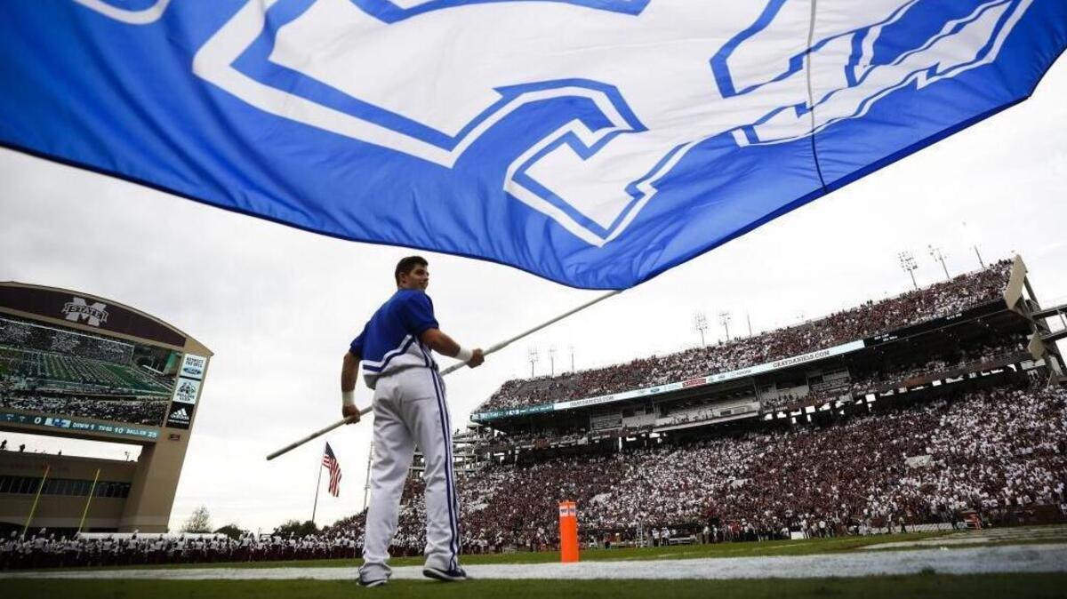 Kentucky plays Louisville in basketball in Rupp Arena at 1 p.m. Friday. The UK football team takes on Northwestern in the Music City Bowl in Nashville at 4:30 p.m.