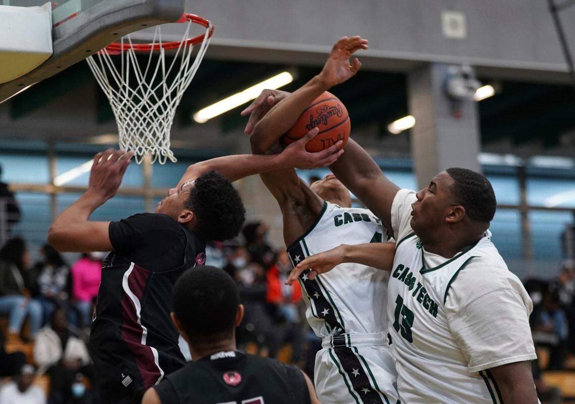 At Cass Tech High School in Detroit, Michigan, Deone Walker (13) was a two-sport standout, playing as a reserve center for the basketball team when football season finished.