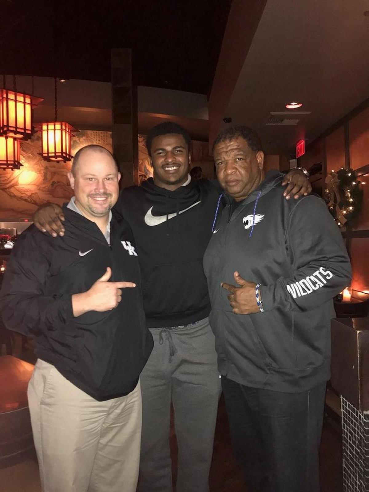 UK football commitment Xavier Peters tweeted a photo of himself with assistant coaches Matt House, left, and Vince Marrow, right, during a recruiting visit last month.