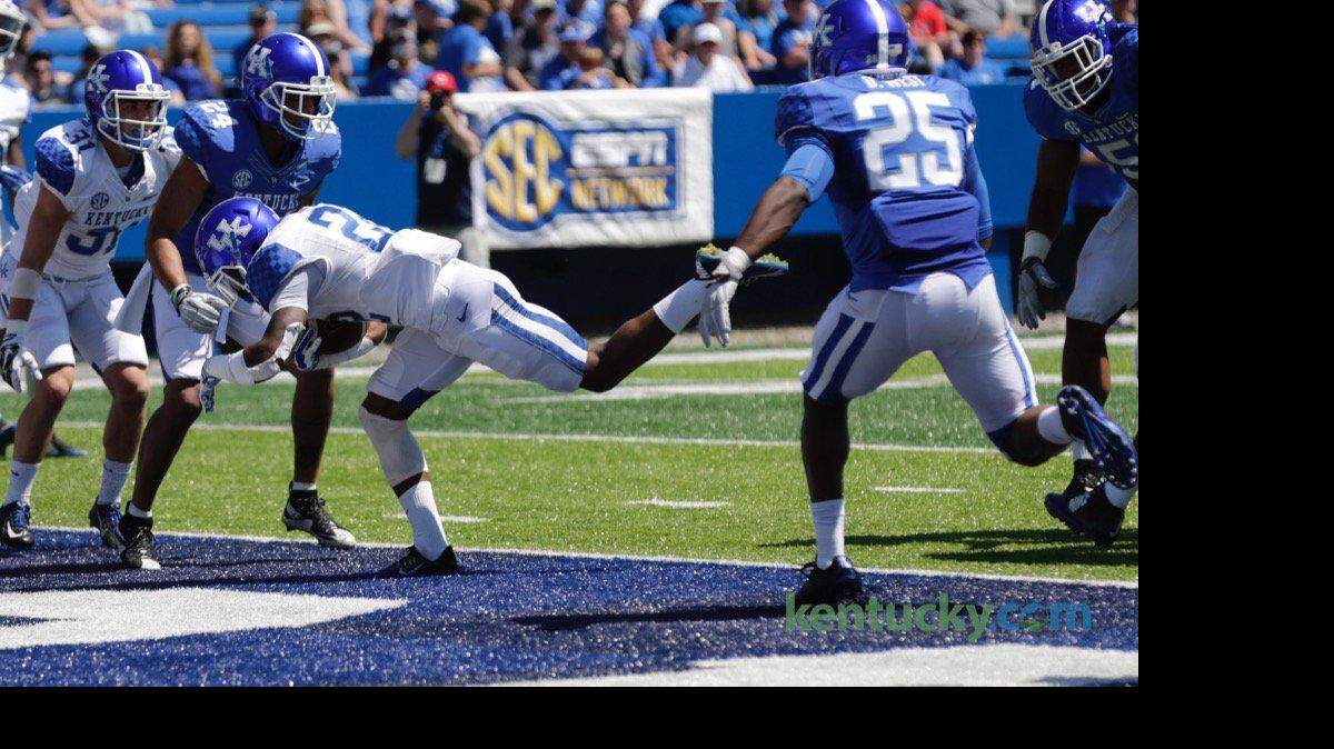 The white team scored a touchdown during the UK's Blue-White scrimmage at Commonwealth Stadium on Saturday.